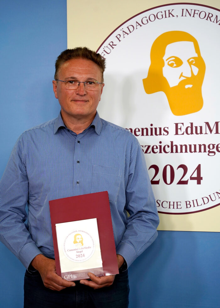 SZENARIS Geschäftführer mit Auszeichnung EduMedia-Medaille auf den Comenius-Awards